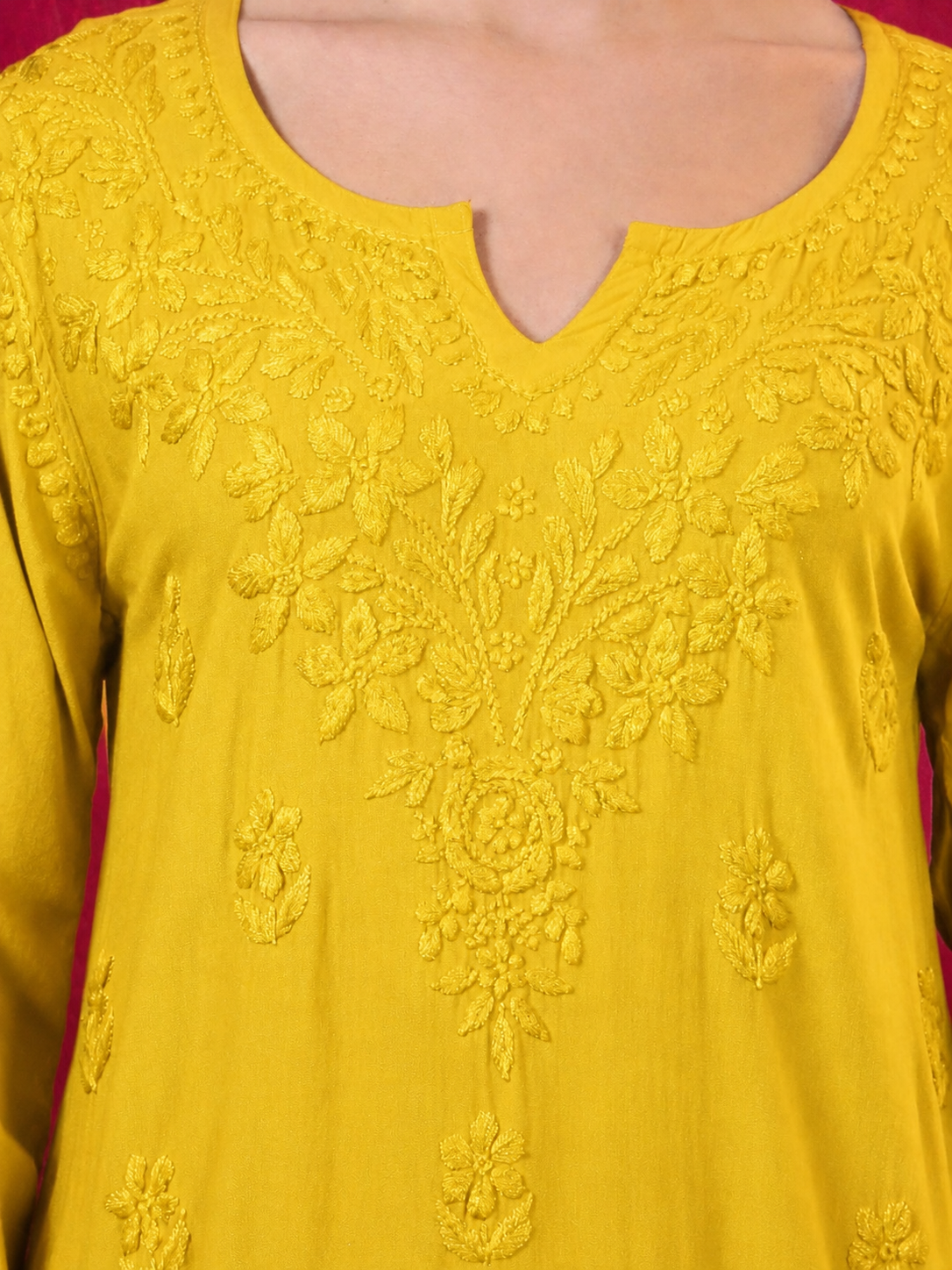 Shruti Rayon Short Kurti for women styled with straight pants, featuring elegant Chikankari embroidery and a comfortable regular fit suitable for office, college and casual outings.