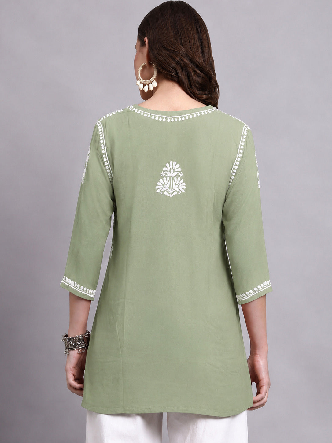 Sirat Rayon Short Top with embroidered neckline detailing, scattered floral motifs and 3/4 sleeves, ideal for comfortable daily ethnic and Indo-western looks.