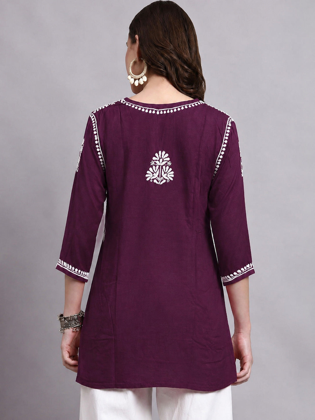 Women’s Sirat Rayon Short Top with detailed floral Chikankari embroidery, soft rayon fabric and a relaxed fit suitable for office, college and casual outings.