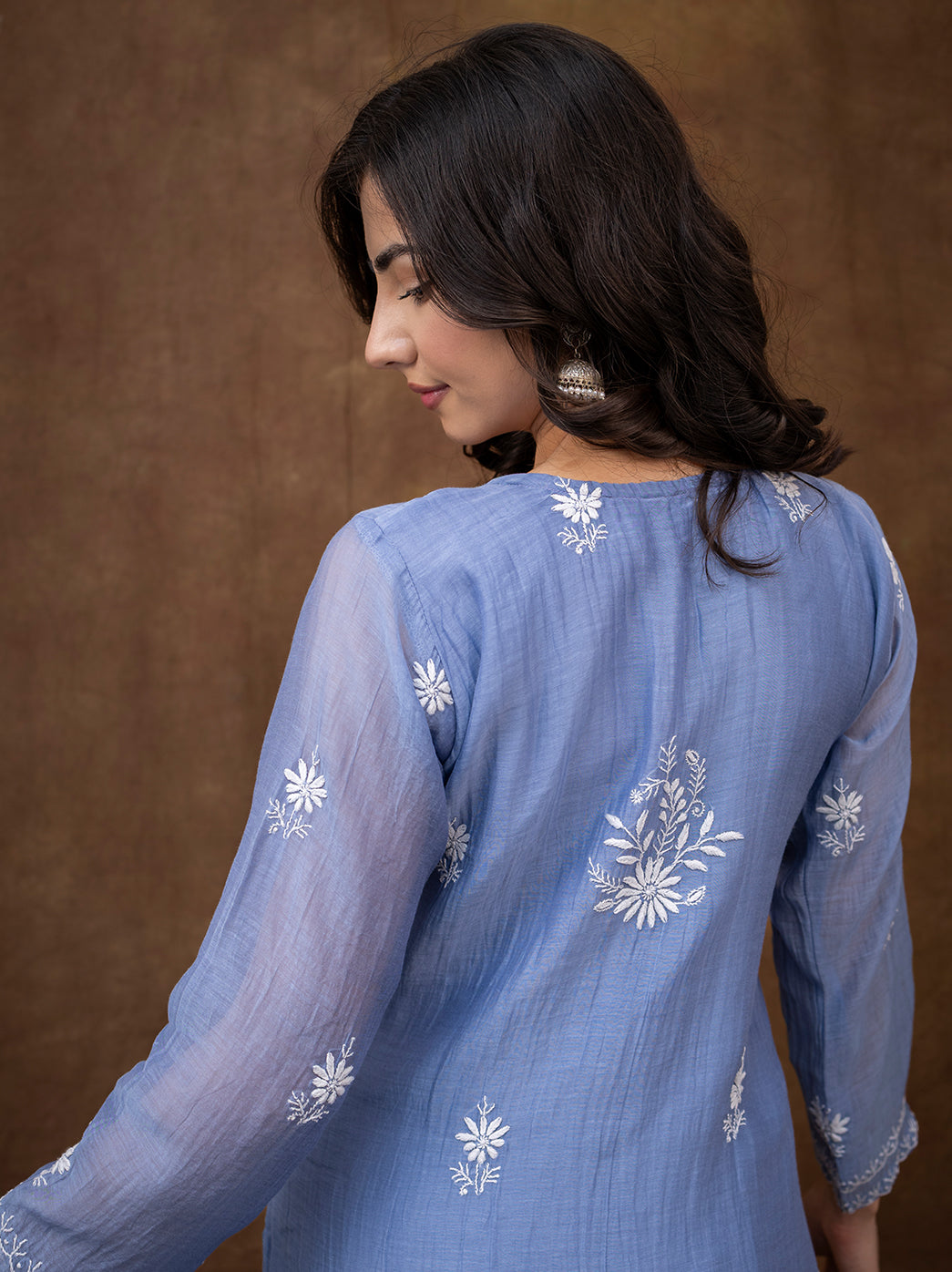 Hand embroidered chikankari kurta set with dupatta styled with traditional accessories for ethnic occasions