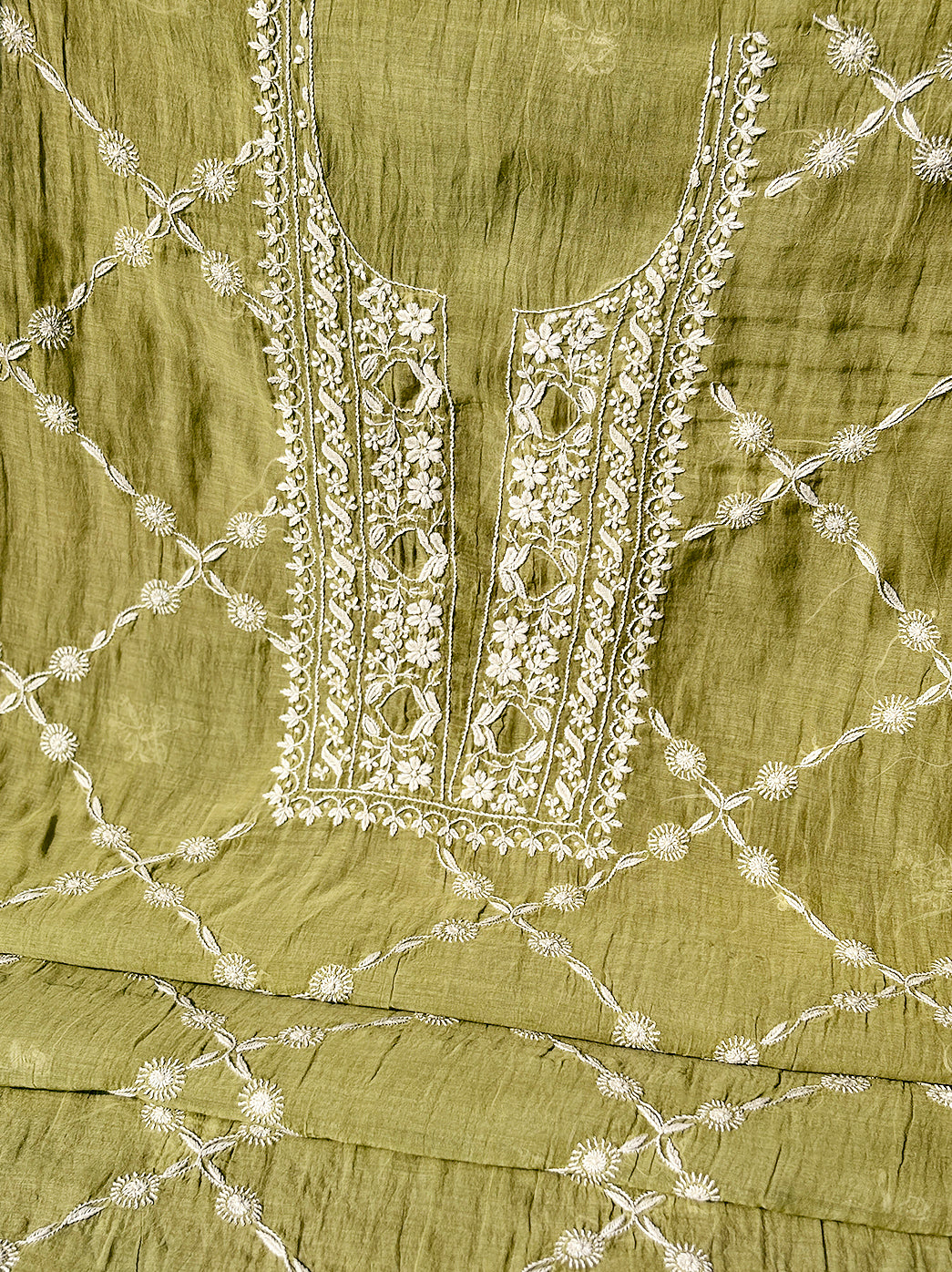 High-resolution image showcasing Mul Chanderi unstitched kurti fabric with premium handcrafted Chikankari motifs.