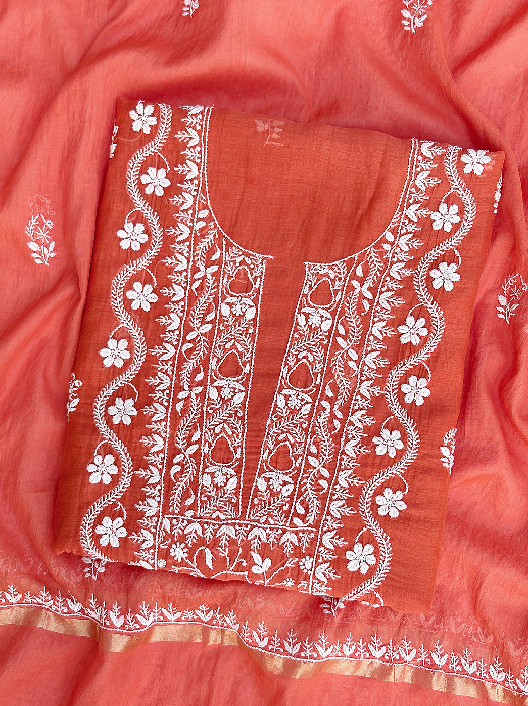 Ethnic chikankari kurti fabric paired with dupatta showcasing fine hand embroidery work