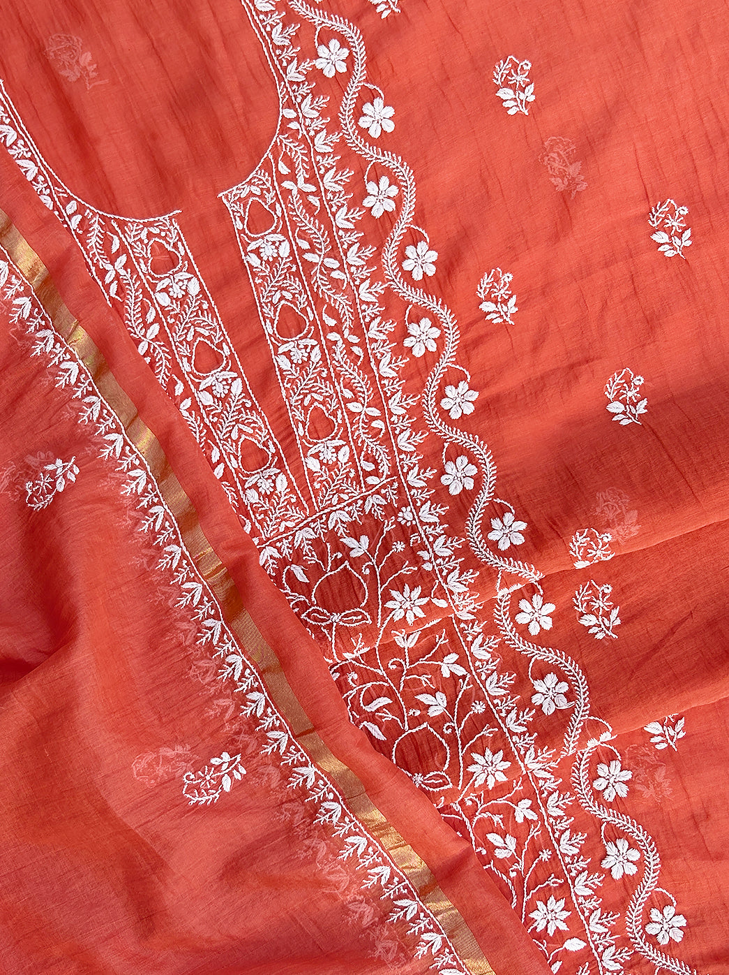 Unstitched chikankari kurti piece with ornate embroidery suitable for festive and cultural occasions