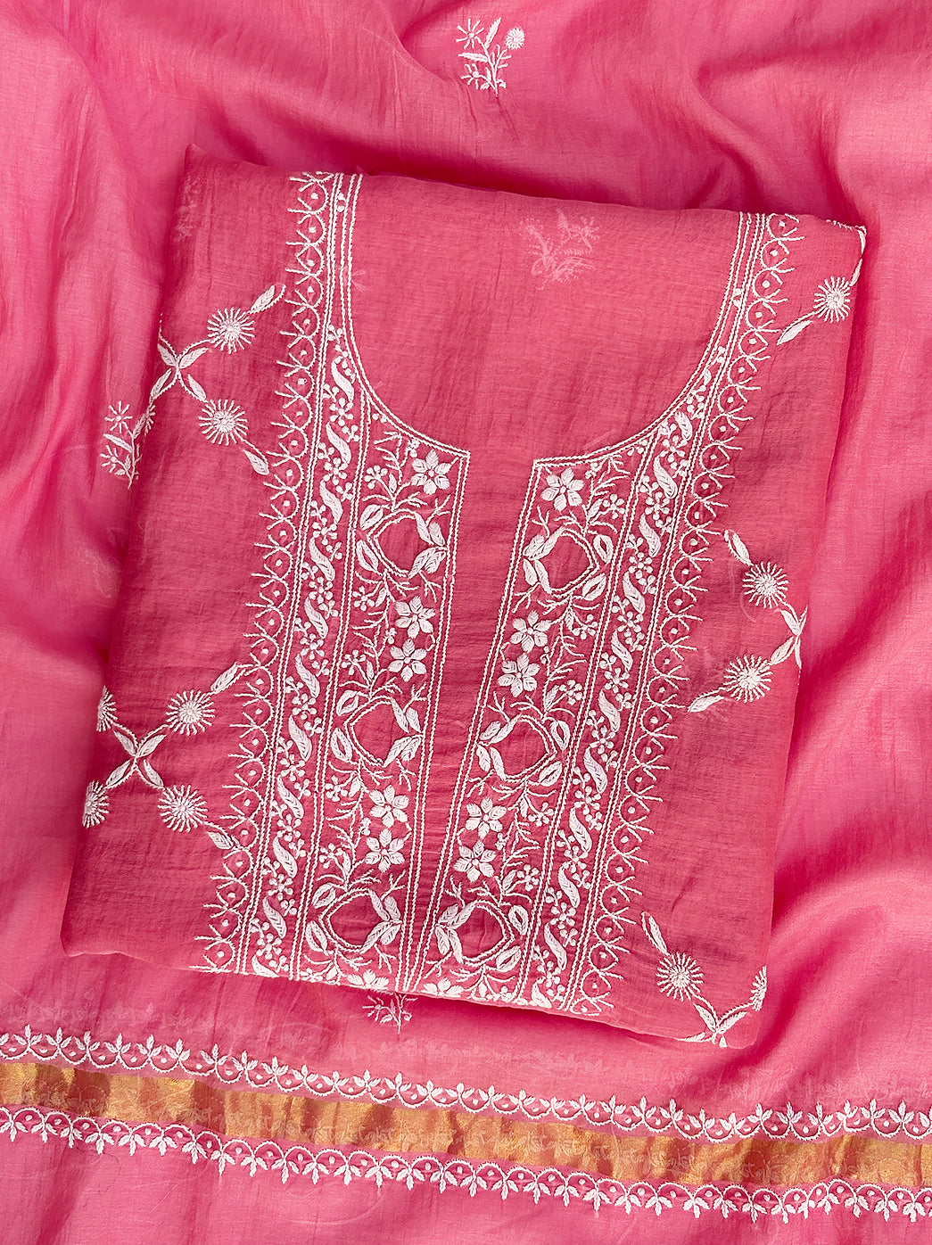 Unstitched chikankari kurti piece crafted in mul chanderi fabric featuring detailed floral embroidery work