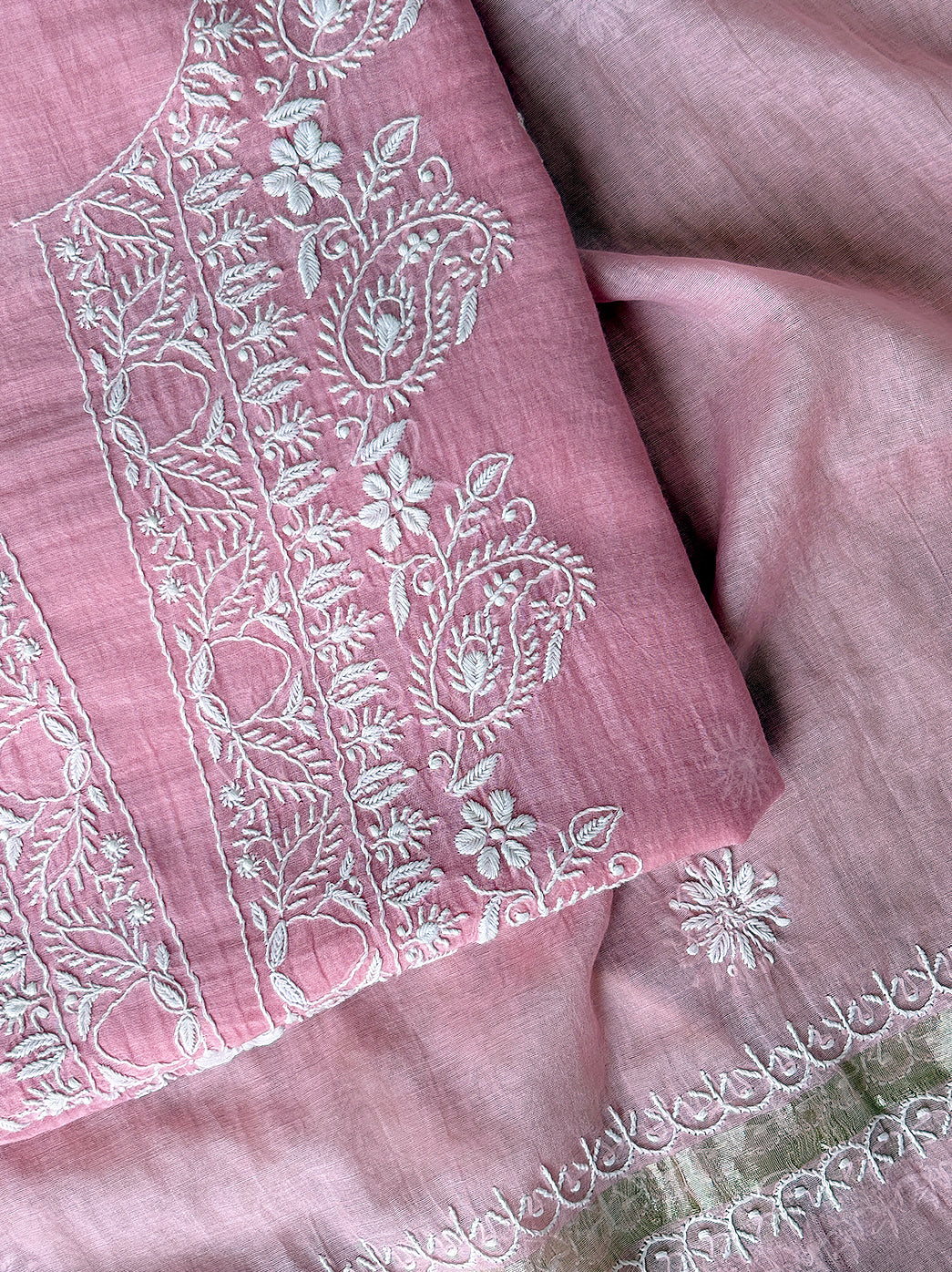 Ethnic mul chanderi unstitched chikankari kurti fabric featuring detailed threadwork patterns and a coordinated dupatta for sophisticated styling