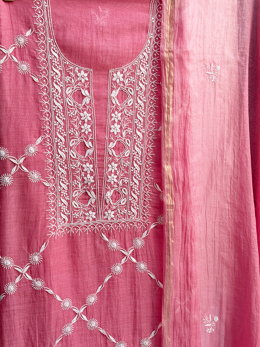 Traditional unstitched chikankari kurti piece with embroidered neckline and dupatta for festive styling