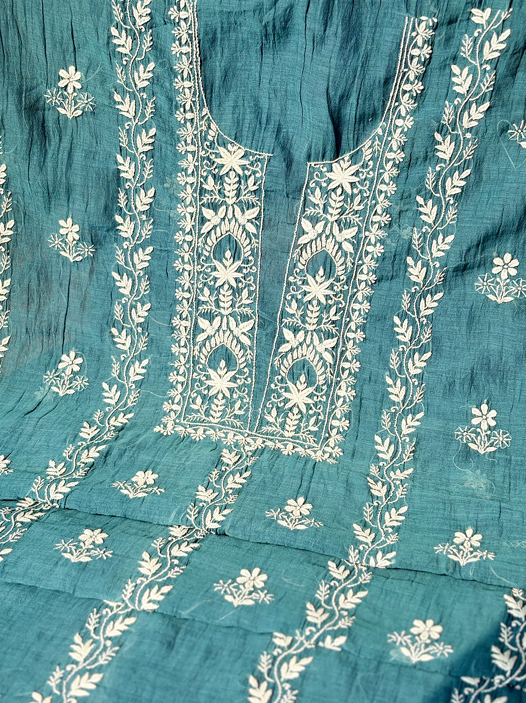 Crafted Mul Chanderi kurti piece with matching dupatta showing finely embroidered neckline and traditional design aesthetics.