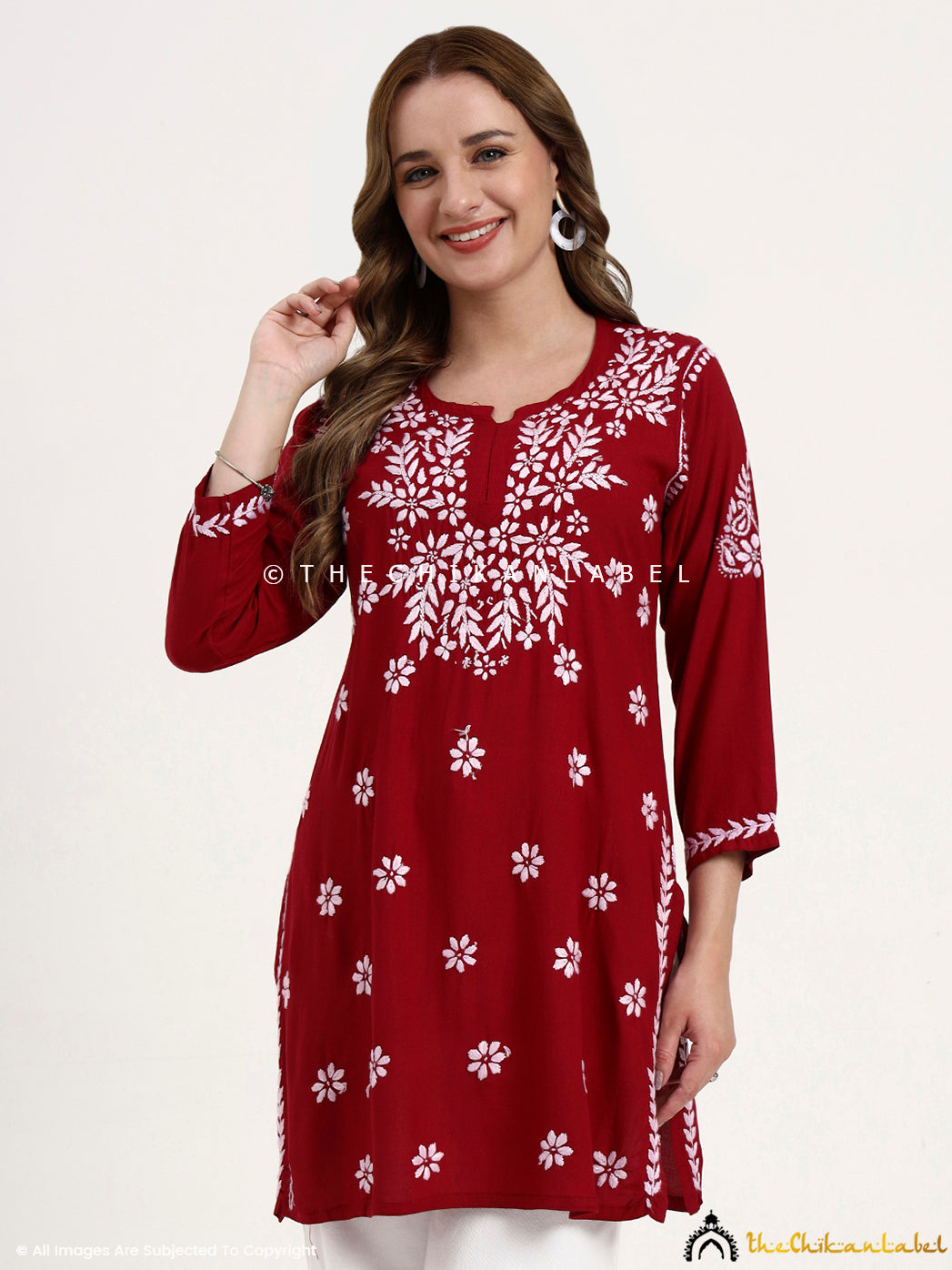 Premium modal short top with intricate chikankari embroidery for women’s ethnic wear.