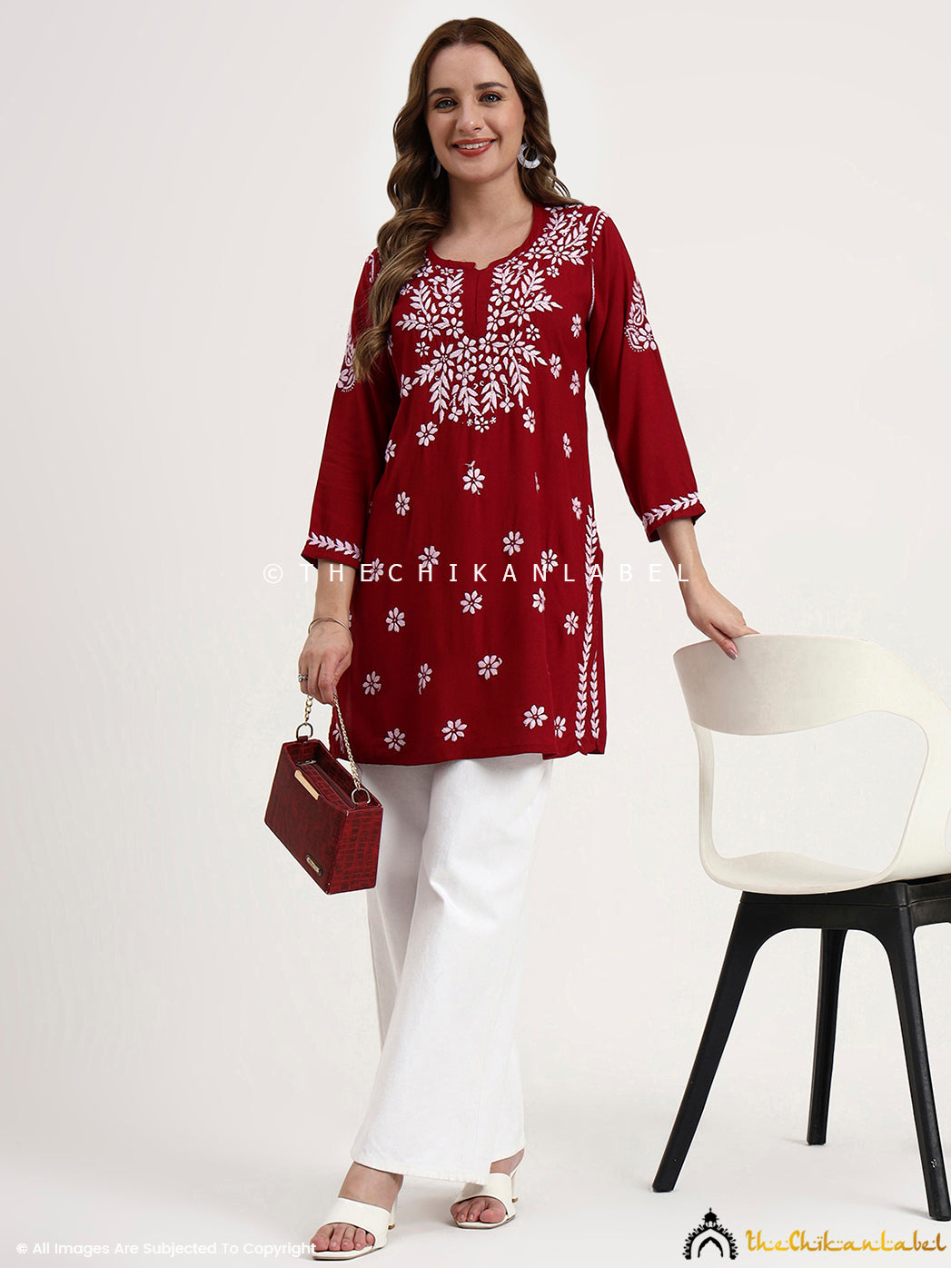 Versatile women’s ethnic wear top with chikankari embroidery in a straight silhouette.