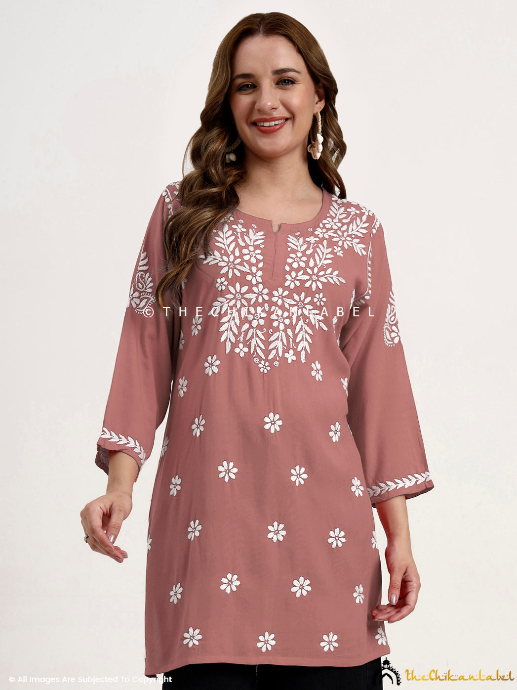 Everyday wear ethnic top with soft modal fabric and hand-stitched chikankari work.