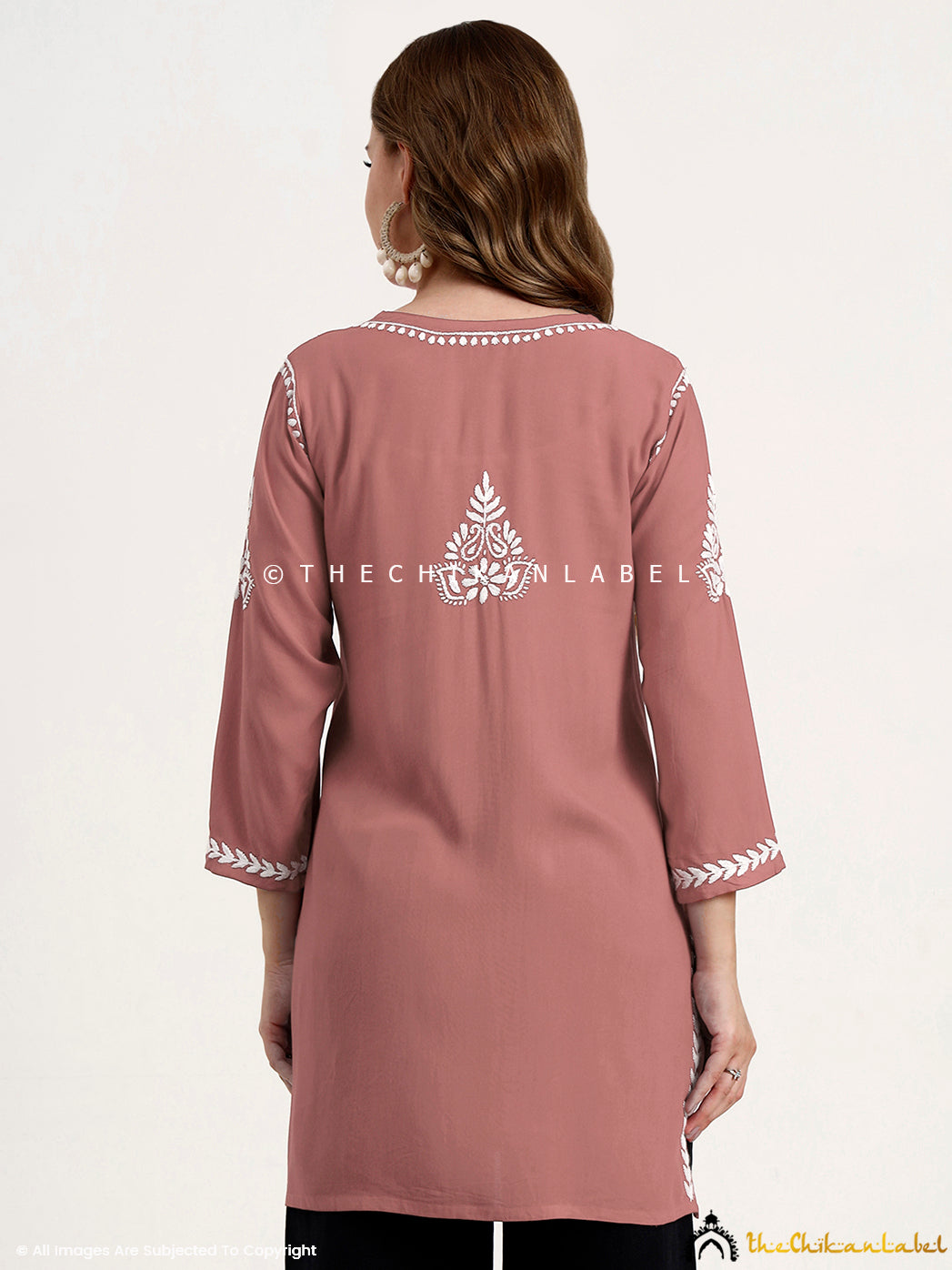 Festive and casual chikankari short top made from lightweight modal material.