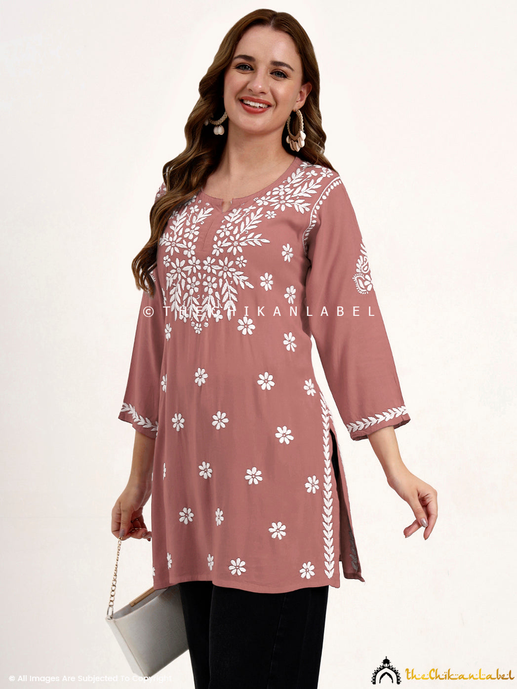 Traditional modal chikankari top with hand embroidery perfect for ethnic occasions.