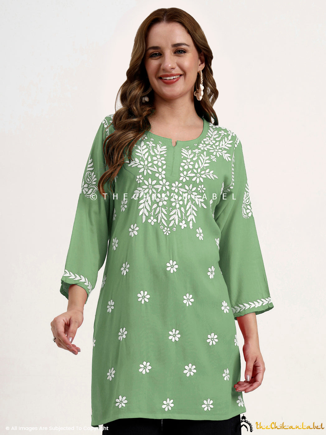Everyday wear ethnic top with soft modal fabric and hand-stitched chikankari work.