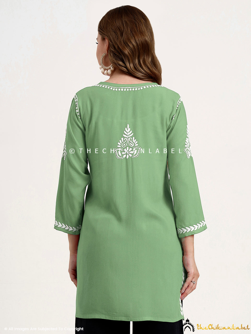 Women’s chikankari short top with authentic embroidery for a classic ethnic look.