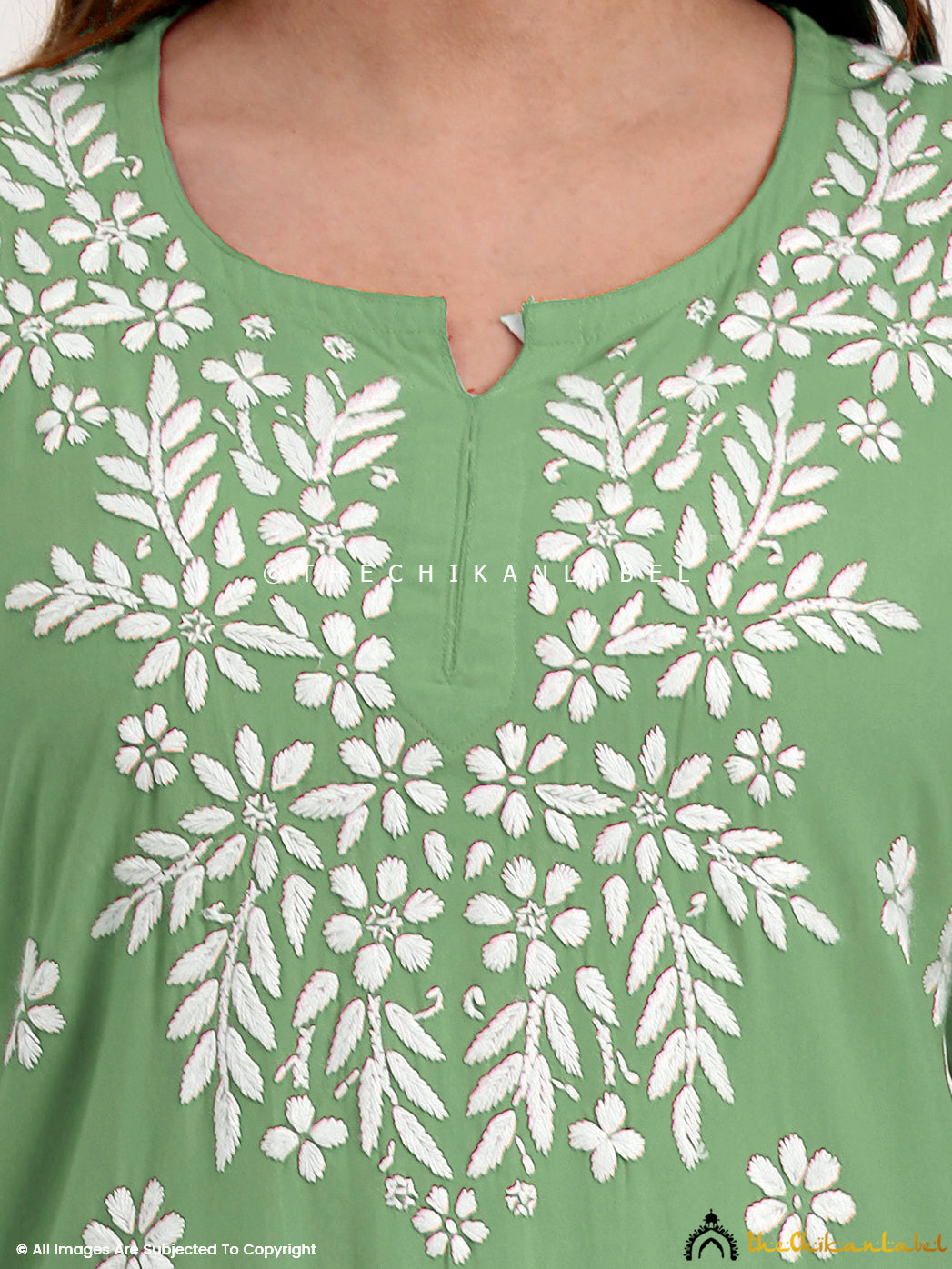 Festive and casual chikankari short top made from lightweight modal material.