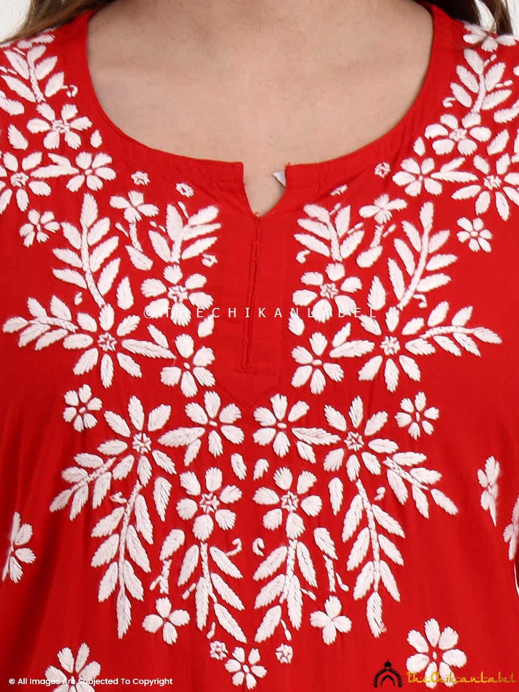 Handcrafted chikankari short top made in modal fabric for comfort and elegance.