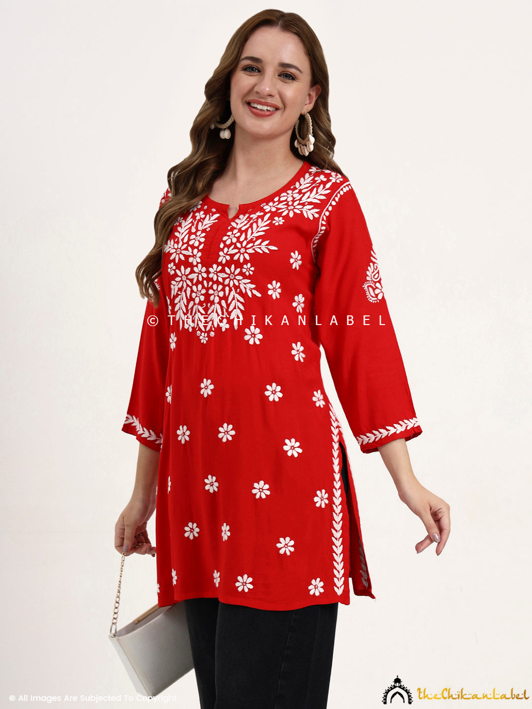 Traditional chikankari embroidered short top made in premium modal fabric.