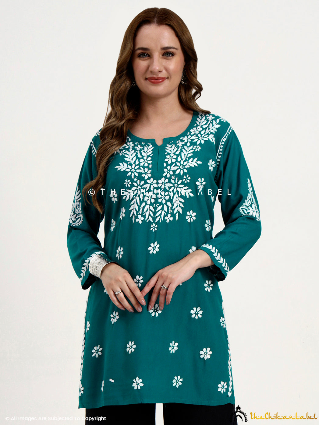 Classic modal chikankari short top perfect for pairing with jeans, leggings, or palazzos.
