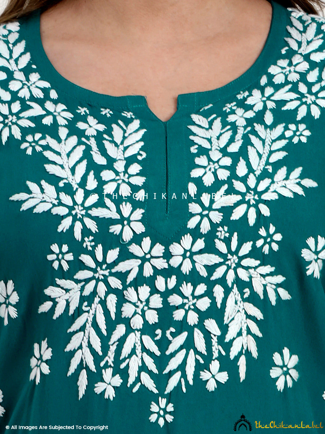 Trending modal chikankari embroidered short kurti top for modern ethnic wear.