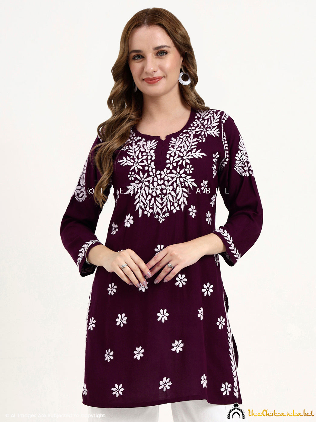 Elegant modal chikankari embroidered short kurti for daily wear and festive occasions.