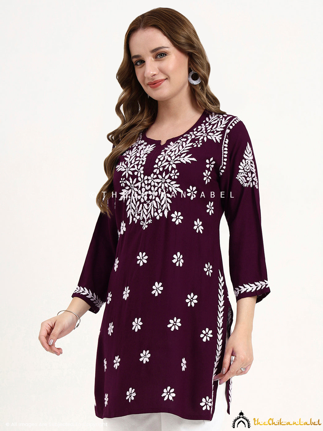 Trending chikankari short top crafted in soft modal fabric with elegant embroidery.