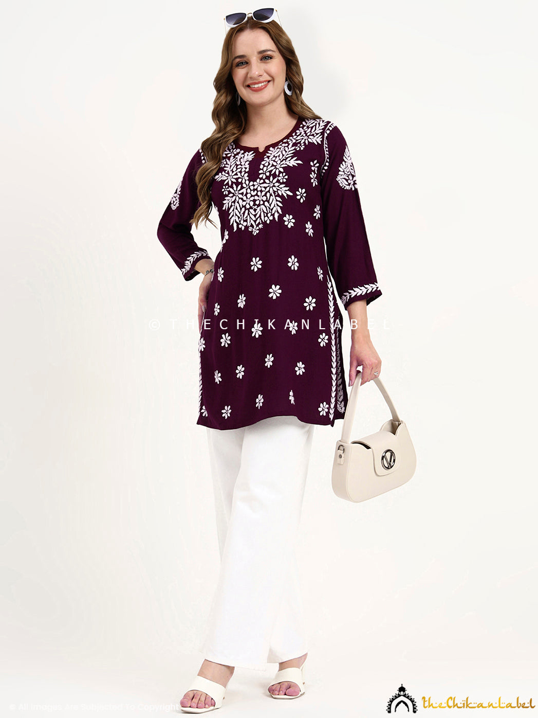 Stylish ethnic wear top for women with authentic chikankari embroidery on modal fabric.