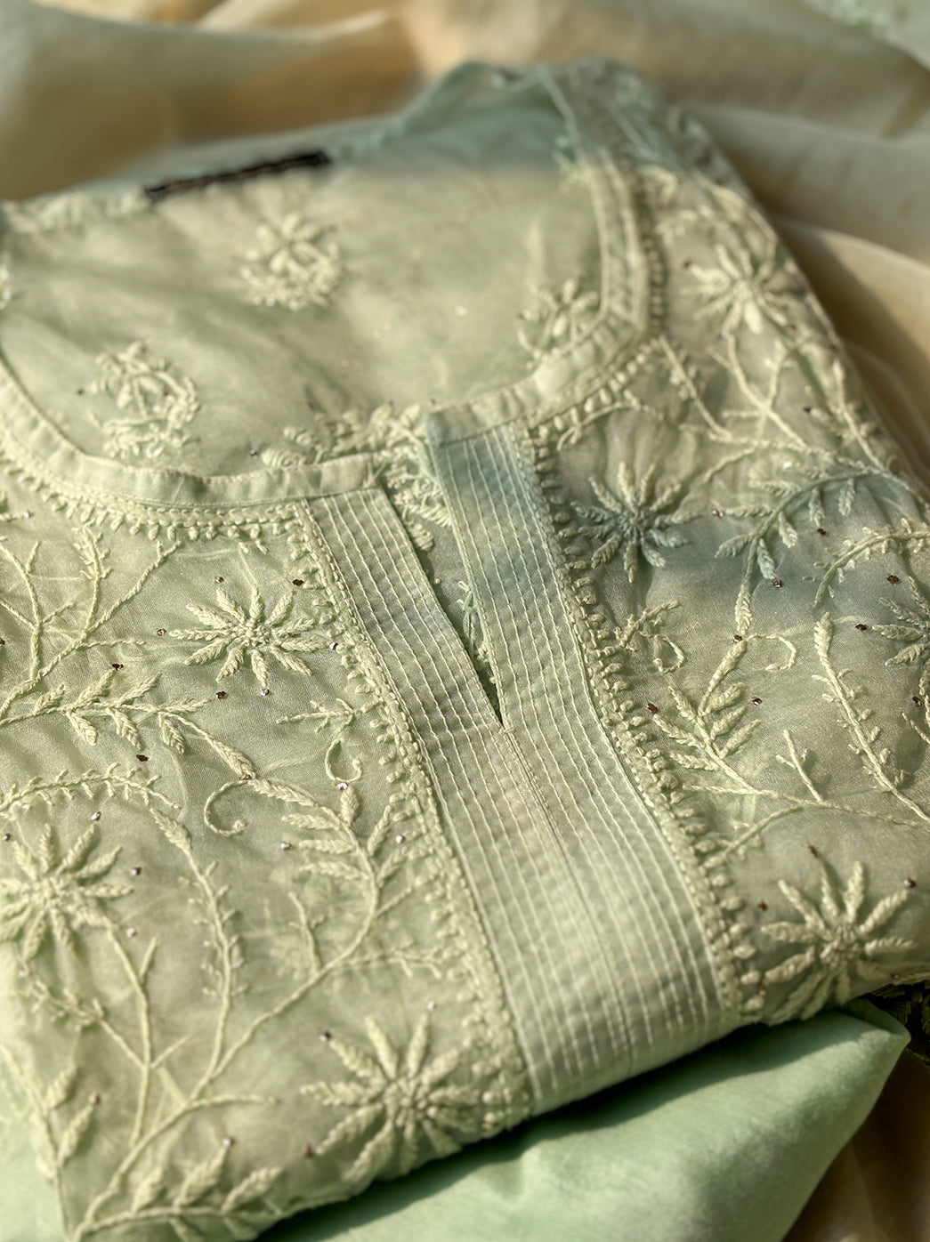 Organza chikankari kurta fabric with dupatta semi-stitched showcasing delicate floral embroidery”