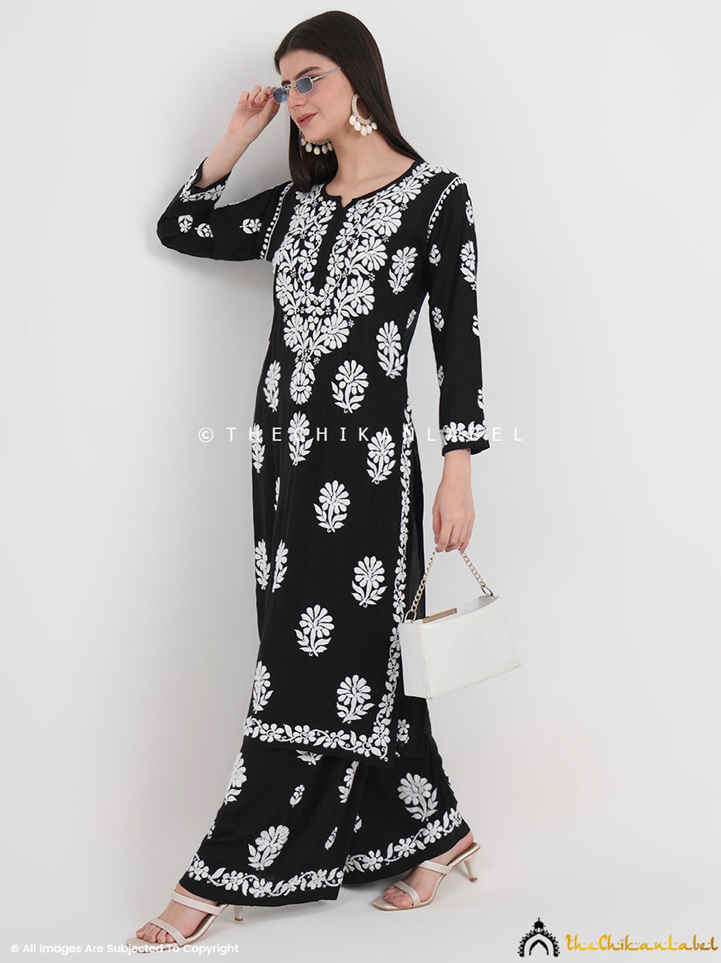 Elegant modal set with signature chikankari work, curated for office hours, festive gatherings, or effortless travel wear.

