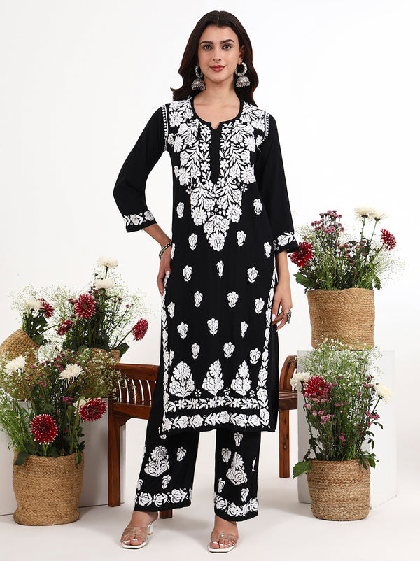 Women wearing chikankari kurti palazzo set with detailed front panel embroidery design