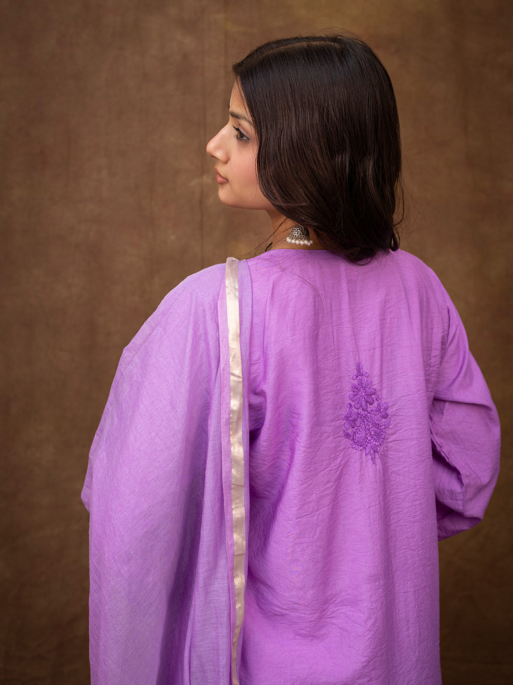 Full length view of chikankari kurta set with dupatta designed in straight fit suitable for festive and cultural occasions