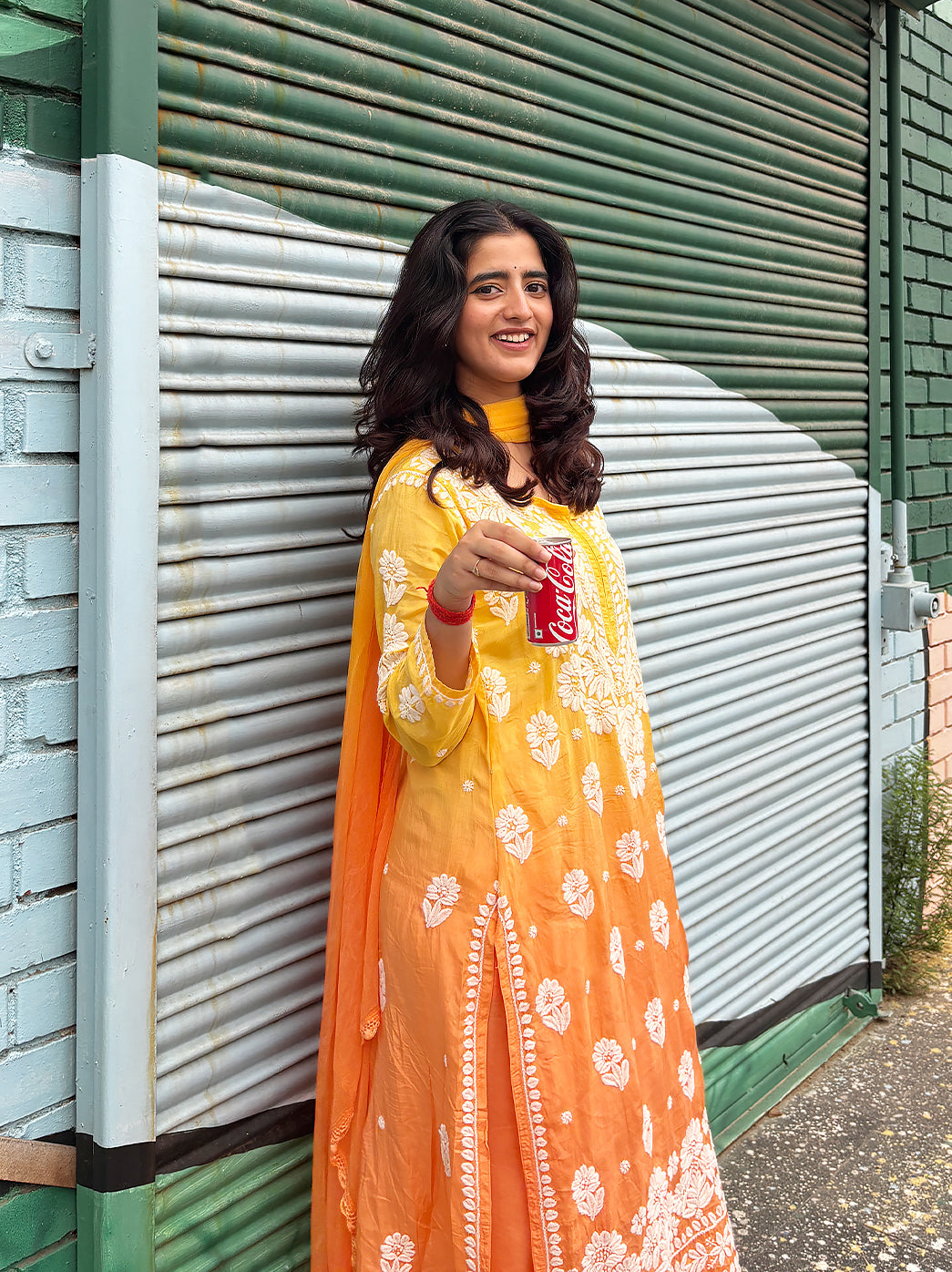 Detailed ethnic fashion look featuring a straight muslin kurta with Chikankari floral embroidery, comfortable pants and a coordinated dupatta for all-day wear.