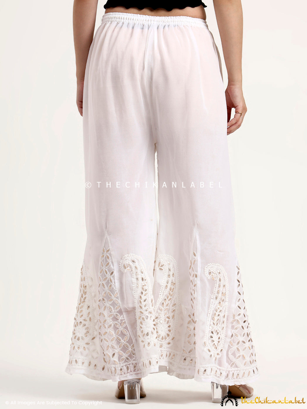 Comfortable regular wear bottom styled as chikankari sharara with artisan embroidery details.