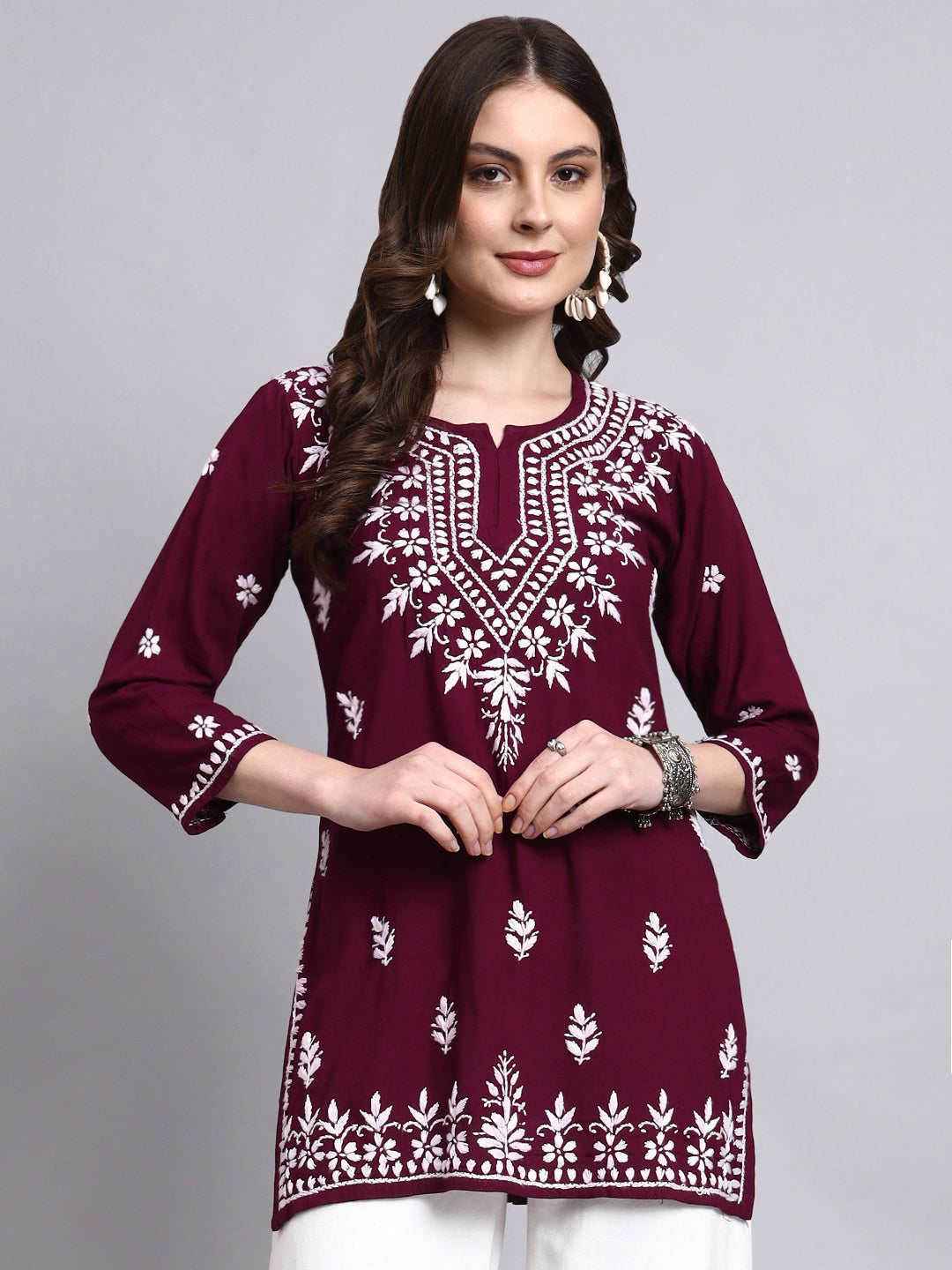 Lightweight rayon short kurta with hand-embroidered chikankari work suitable for office and casual wear