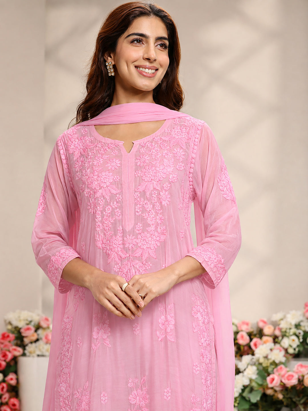 Women’s Yamika Muslin Chikankari Straight Kurta Set with Dupatta crafted in breathable muslin fabric with detailed Lucknowi embroidery and a comfortable relaxed silhouette.