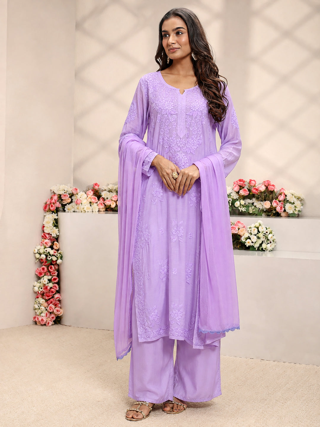 Comfortable regular wear set for women featuring the Yamika Muslin Chikankari kurta with traditional embroidery, matching bottoms and a lightweight coordinated dupatta.