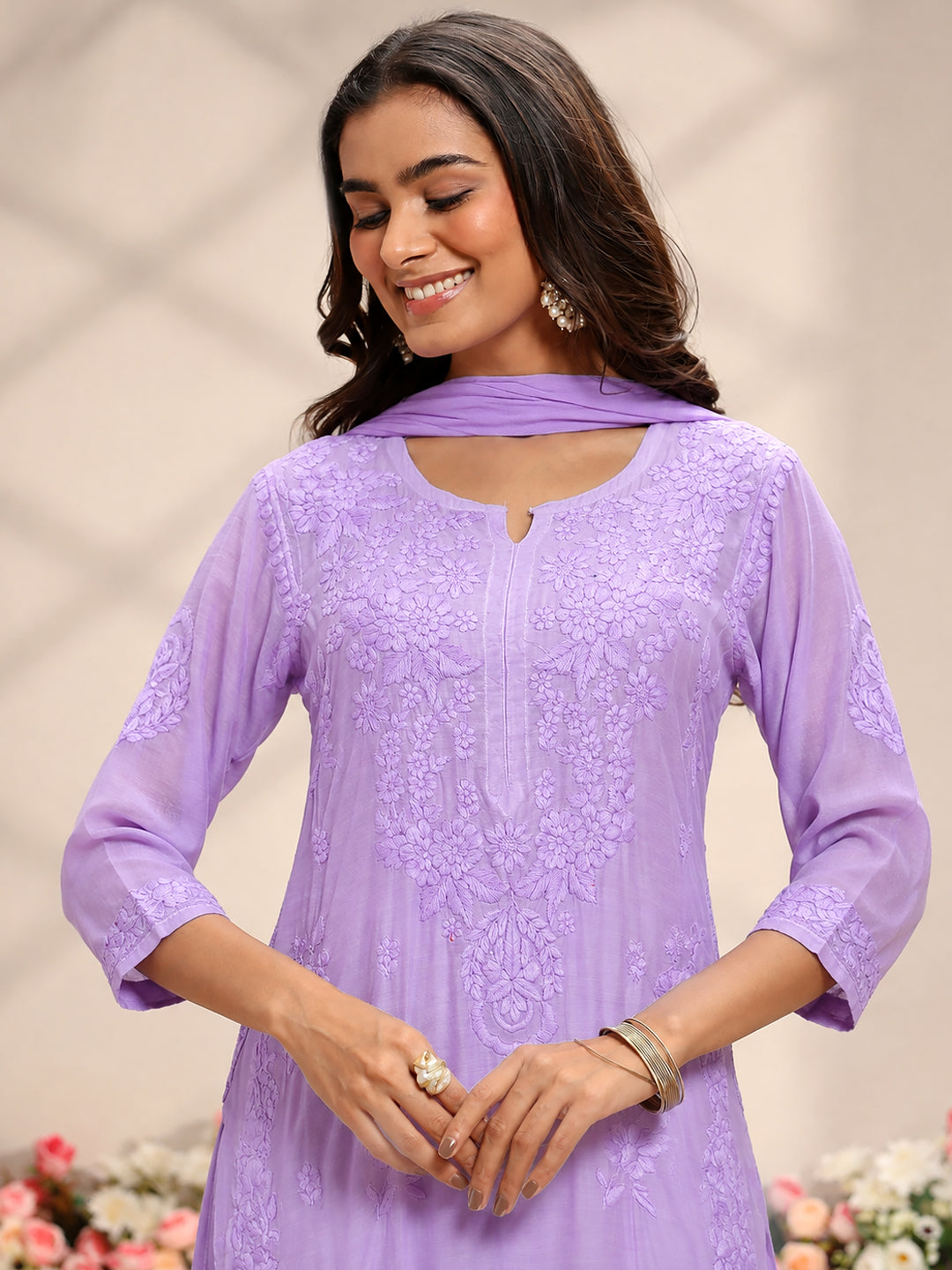 Trending Chikankari set for women with a breathable muslin straight kurta, intricate Lucknowi-inspired embroidery, relaxed bottoms and an elegant matching dupatta.