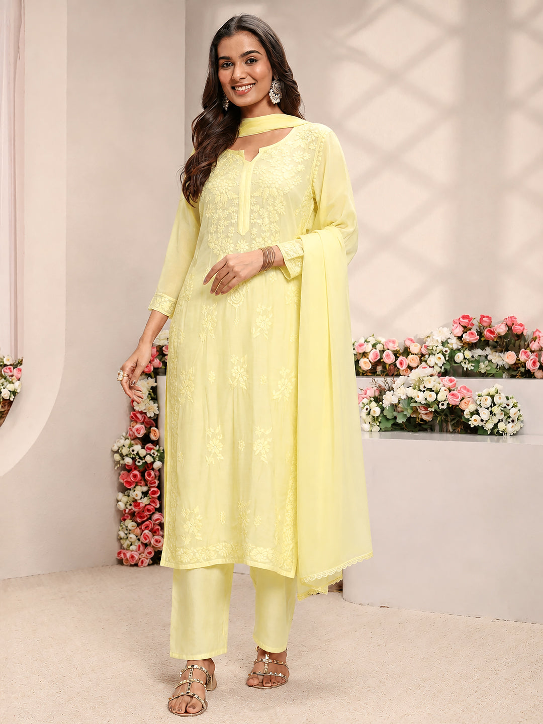 Women’s comfortable muslin kurta set with detailed Chikankari embroidery, straight silhouette, coordinated bottoms and dupatta for effortless everyday ethnic styling.