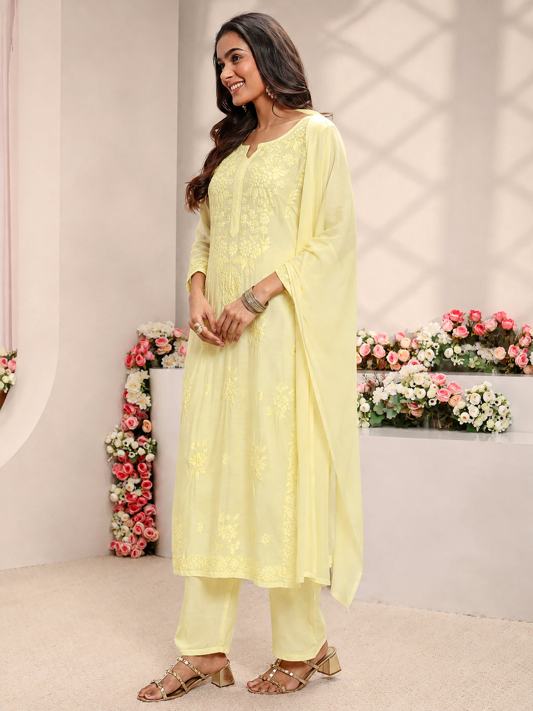 Yamika trending Chikankari set featuring a long straight muslin kurta with detailed embroidery, comfortable wide-leg bottoms and a lightweight dupatta for graceful ethnic wear.