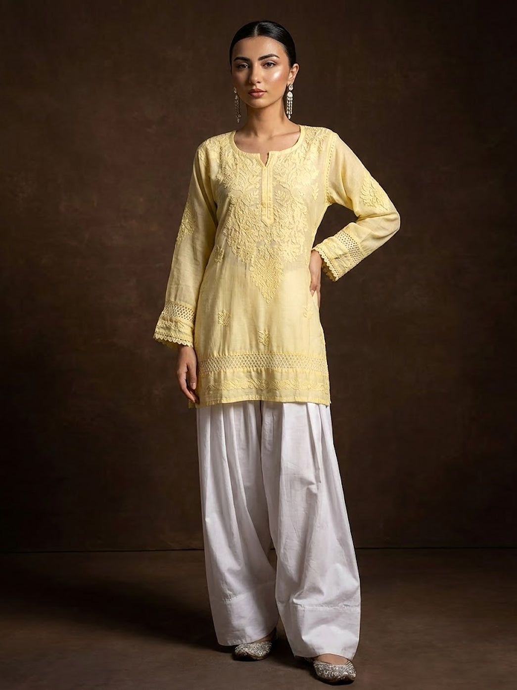 Chanderi chikankari kurti paired with traditional farshi salwar, featuring delicate hand embroidered floral motifs and an elegant ethnic silhouette