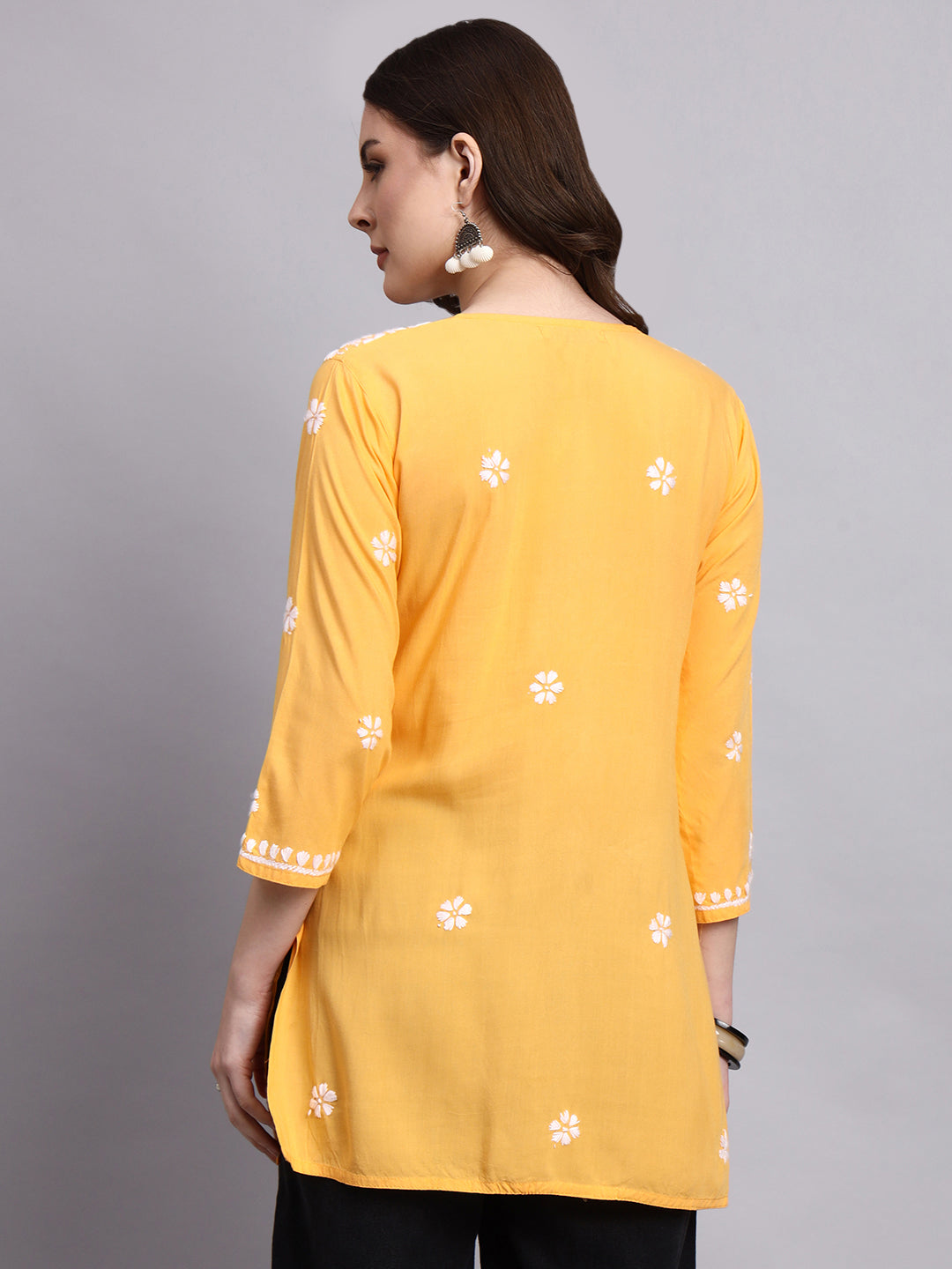Trending ethnic short kurta crafted with hand-embroidered chikankari and breathable rayon material