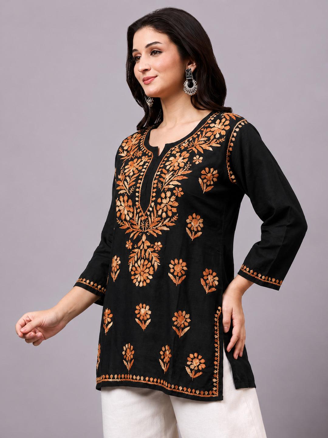 Premium Chikankari short kurta showcasing heritage embroidery artistry with modern comfort and fashionable everyday ethnic look
