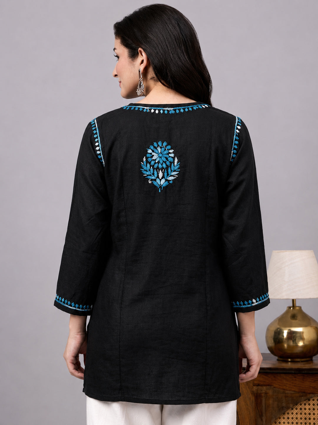 Trending Rayon Short Kurta for women designed with intricate Chikankari embroidery and easy-to-style modern ethnic silhouette