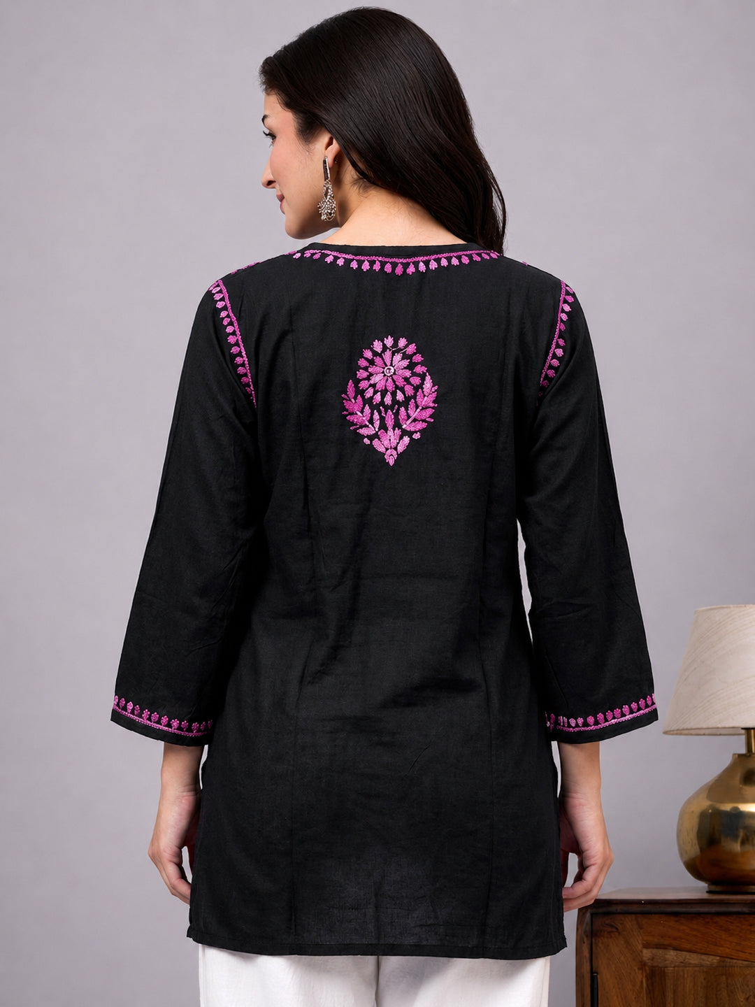 Premium rayon Chikankari short kurta designed with traditional embroidery patterns, lightweight fabric, and modern ethnic fashion styling