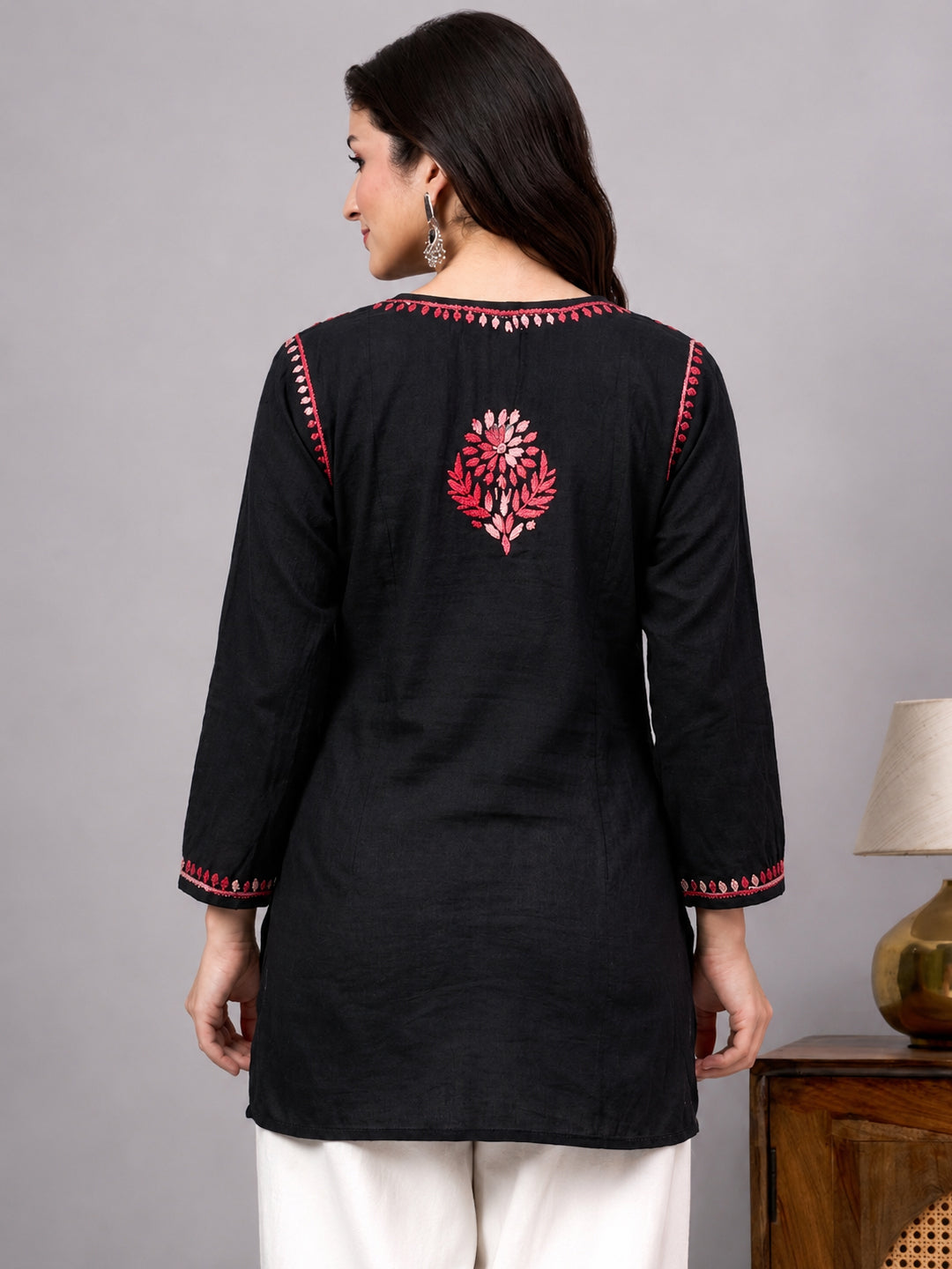 Women’s Chikankari top made with soft breathable rayon fabric featuring detailed embroidery and a fashionable short length design
