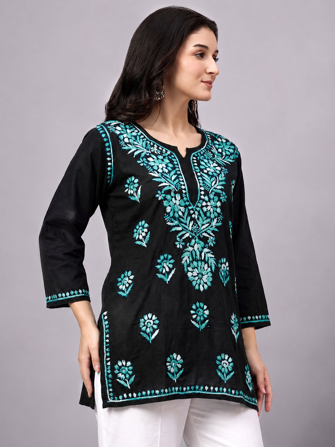 Women’s Chikankari top made with soft breathable rayon fabric featuring detailed embroidery and a fashionable short length design