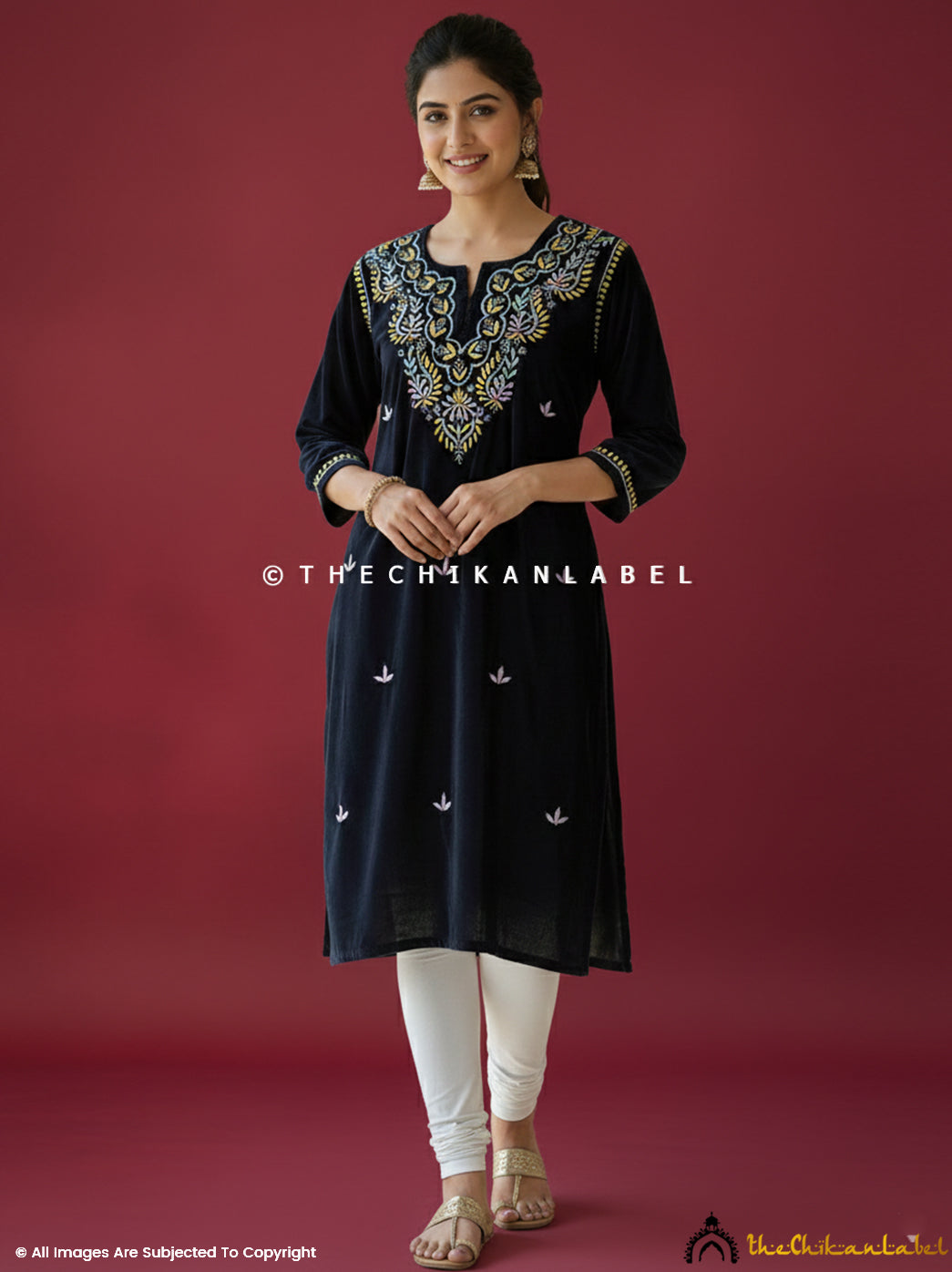 Hand-embroidered velvet chikankari short kurta with intricate neckline detailing and artisan-crafted floral motifs for elegant ethnic wear.