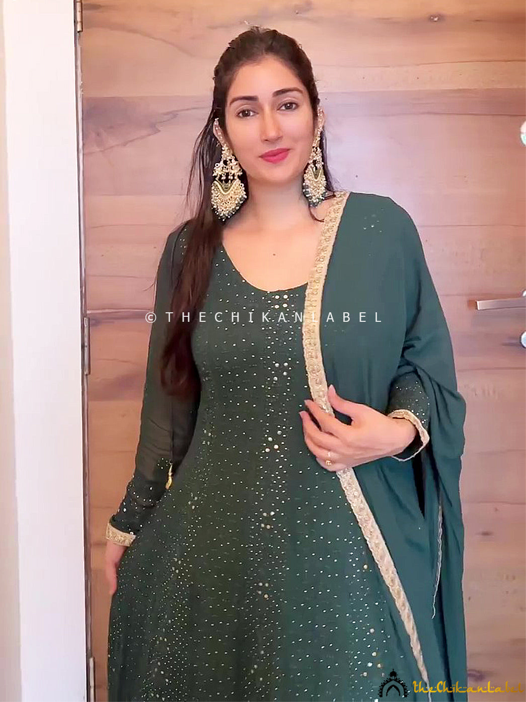 Graceful wedding outfit featuring full-length flared chikankari kurta and complementing dupatta

