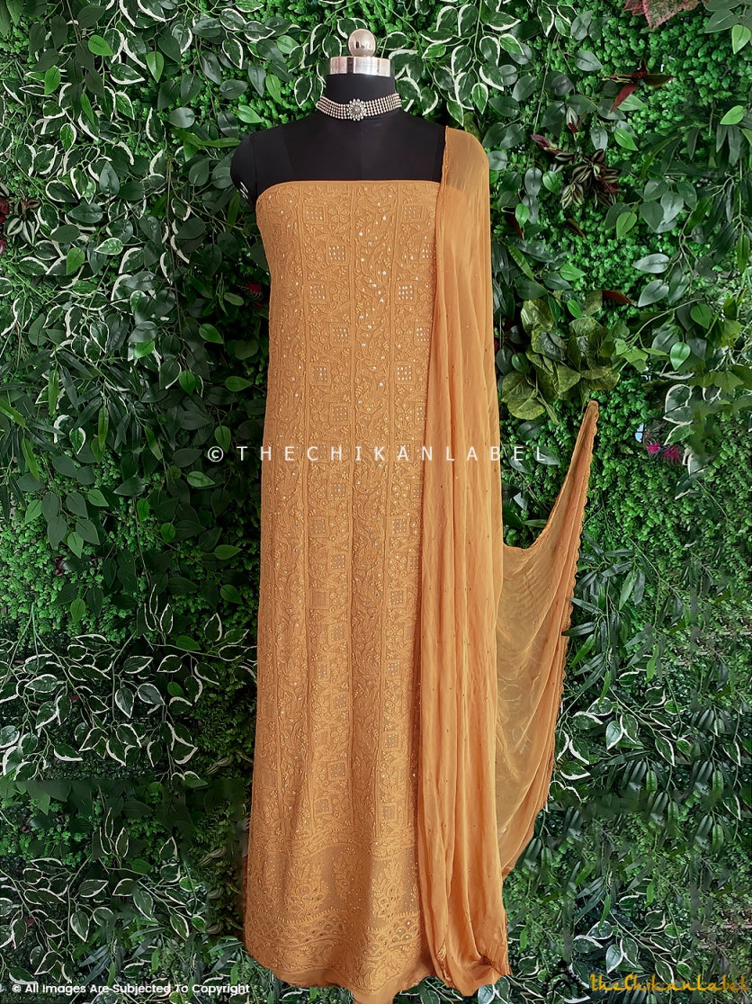 Mar“Unstitched viscose chikankari kurti piece with dupatta featuring handcrafted Lucknowi embroidery and mirror work”igold Un-Stitched Mukaish Suit with Dupatta
