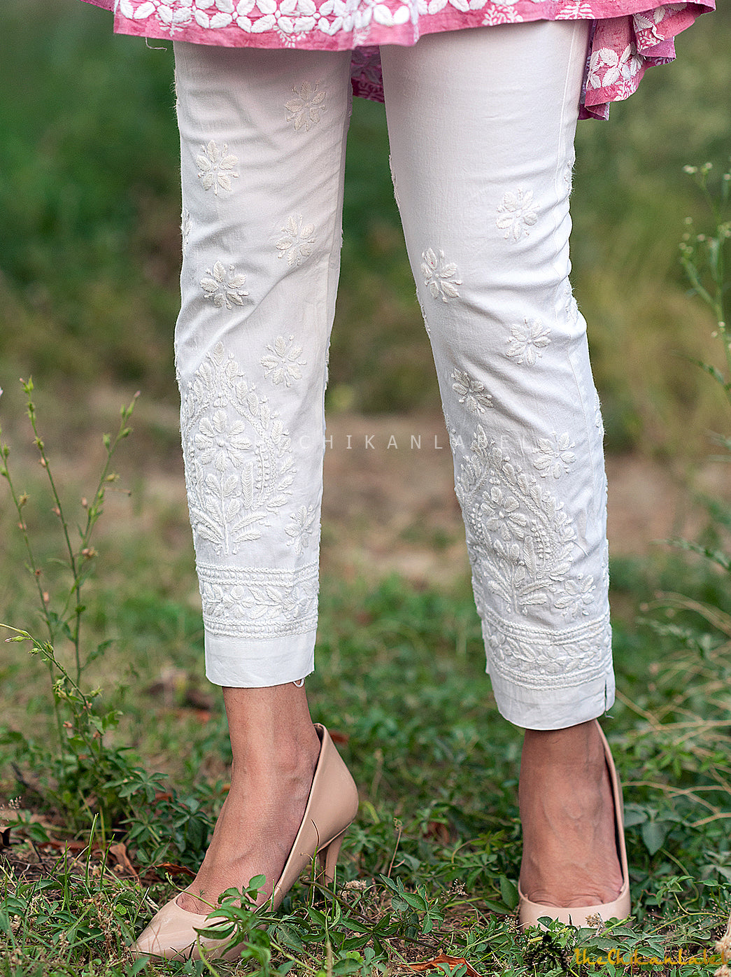 White Adya Lycra Straight Chikankari Cigarette Pant, Shop now from a collection of chikankari cigarette pants at Thechikanlabel, Buy lucknow chikankari straight cigarette pants online at best price.