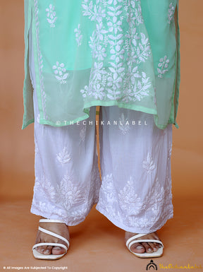 White Adab Modal Chikankari Straight Palazzo - Thechikanlabel, Shop now from a collection of modal chikankari palazzo at Thechikanlabel, Buy lucknow chikankari straight modal palazzos online at best price.